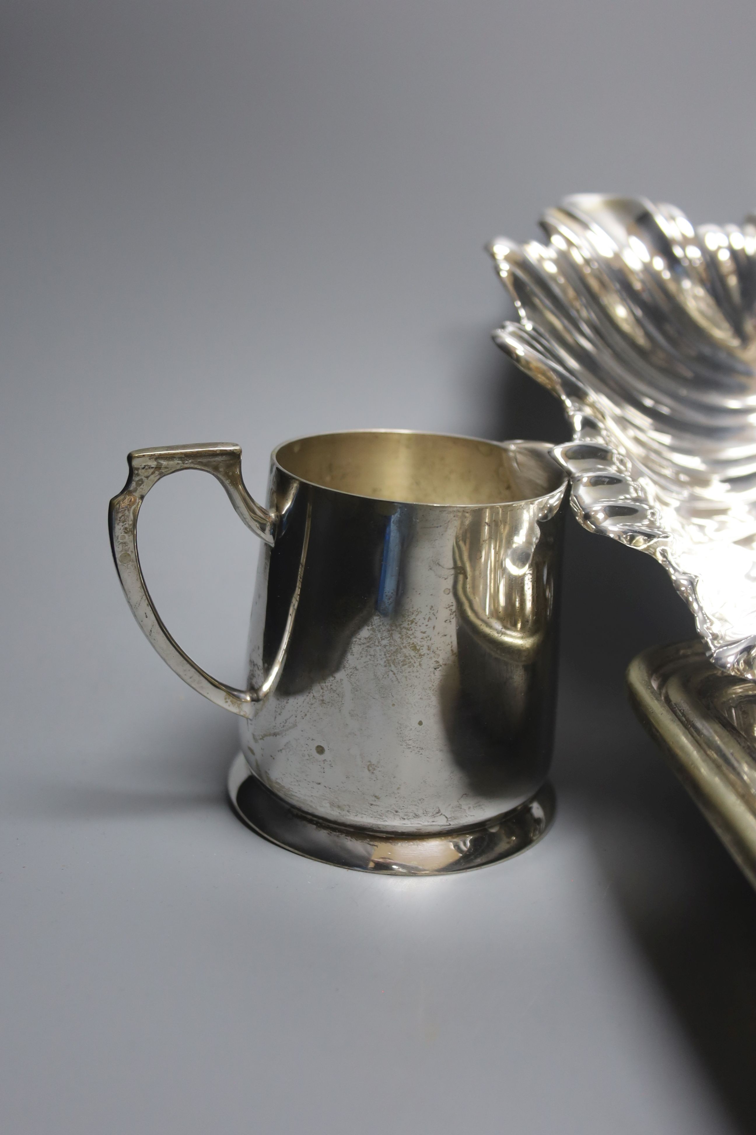 Assorted plated wares including hotel plate, entree dish and cover and claret jug mounts.